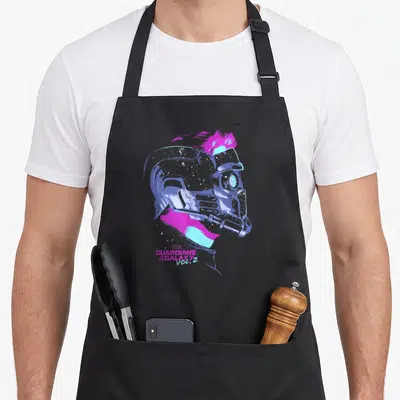 Tablier de cuisine noir avec illustration colorée du masque Star-Lord et texte Guardians Vol.2 en néon.