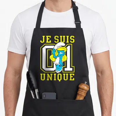 Tablier de cuisine noir avec Schtroumpfette et le texte Je suis Unique 01 en jaune et blanc.