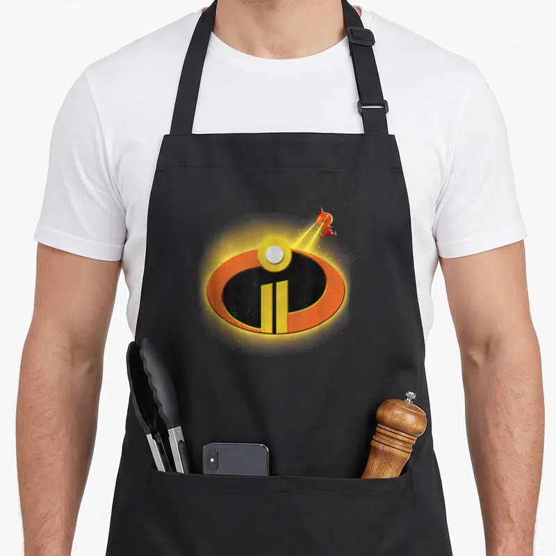 Tablier de cuisine noir avec le logo orange des Indestructibles 2 et Jack-Jac.