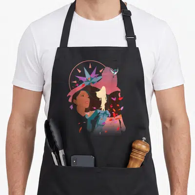 Tablier de cuisine noir avec une illustration stylisée de Pocahontas aux couleurs vives et un colibri en vol.
