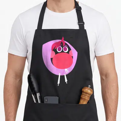 Tablier de cuisine noir avec illustration du personnage Embarrassment au visage rose et bouche rouge.