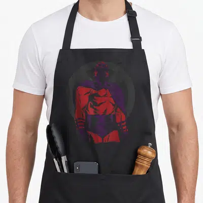 Tablier de cuisine noir avec Magneto Epic Tonal Silhouetted en rouge et violet devant un logo X.
