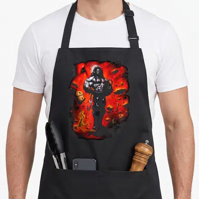 Tablier de cuisine noir avec une illustration colorée du personnage Lobo sur fond rouge et noir.
