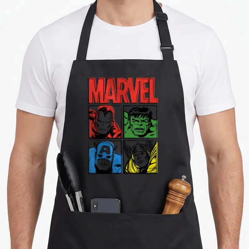 Tablier de cuisine noir avec illustration vintage Marvel Iron Man Hulk Captain America Thor dans quatre cases colorées.