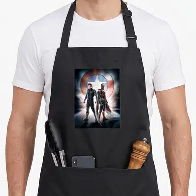 Tablier de cuisine noir avec Bucky Barnes et Sam Wilson devant un bouclier à étoile.