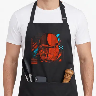 Tablier de cuisine noir avec illustration technique d'un casque Sith Trooper rouge et bleu.