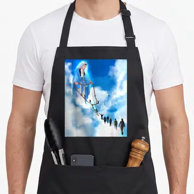 Tablier de cuisine noir avec une illustration de la Vierge Marie tenant un chapelet reliant des silhouettes dans les nuages bleus.
