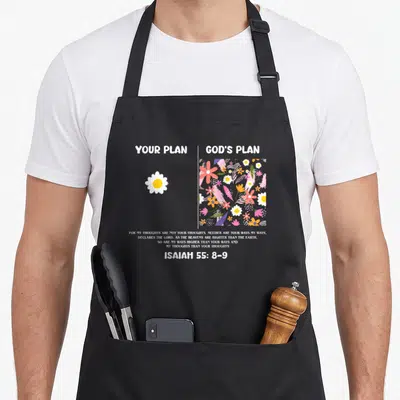 Tablier de cuisine noir avec Your Plan God's Plan Isaiah 55:8-9 et illustrations florales contrastées.