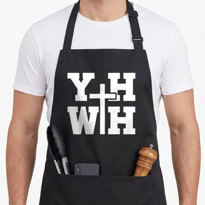 Tablier de cuisine noir avec inscription YHWH et croix blanche texturée au centre du motif imprimé.