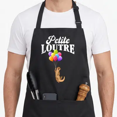 Tablier de cuisine noir avec une loutre marron tenant un bouquet de ballons colorés sous le texte Petite Loutre en blanc.