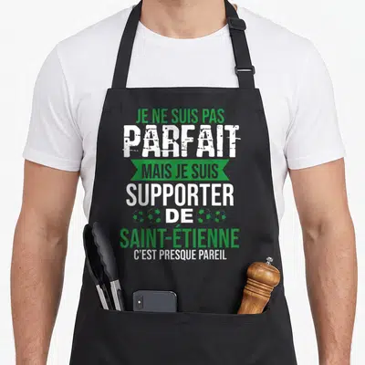 Tablier de cuisine noir avec texte blanc et vert Je ne suis pas parfait mais je suis supporter de Saint-Étienne c'est presque pareil.