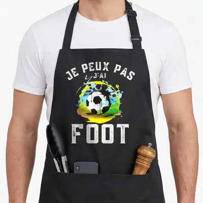 Tablier de cuisine noir avec motif Je peux pas j'ai foot et ballon de football coloré.
