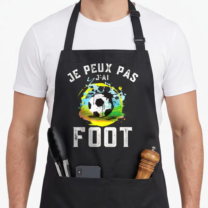 Tablier de cuisine noir avec motif Je peux pas j'ai foot et ballon de football coloré.