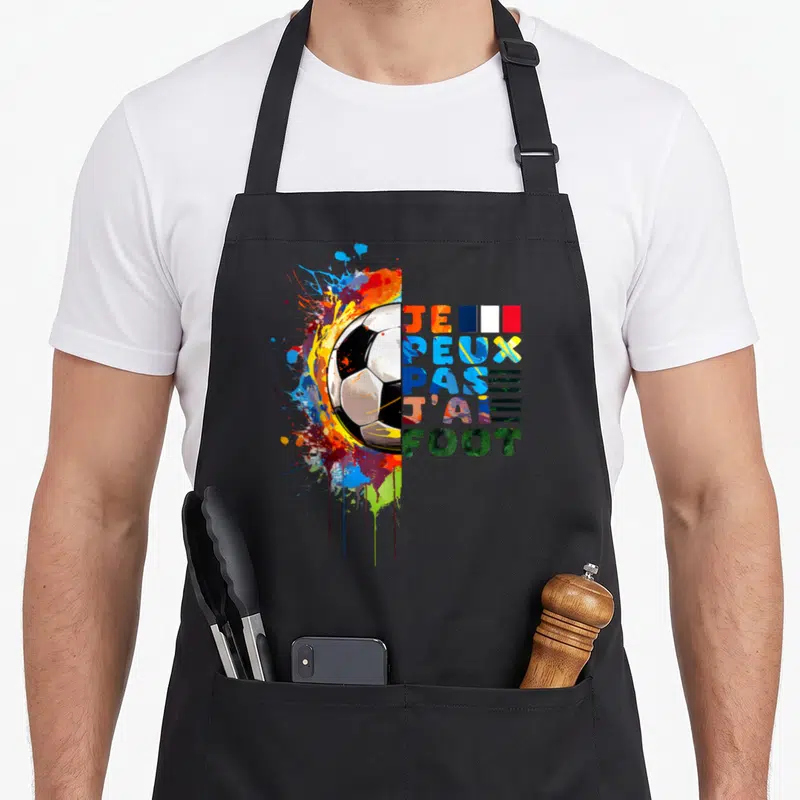 Tablier de cuisine noir avec un ballon de foot et l'inscription Je peux pas j'ai foot France stylisée.