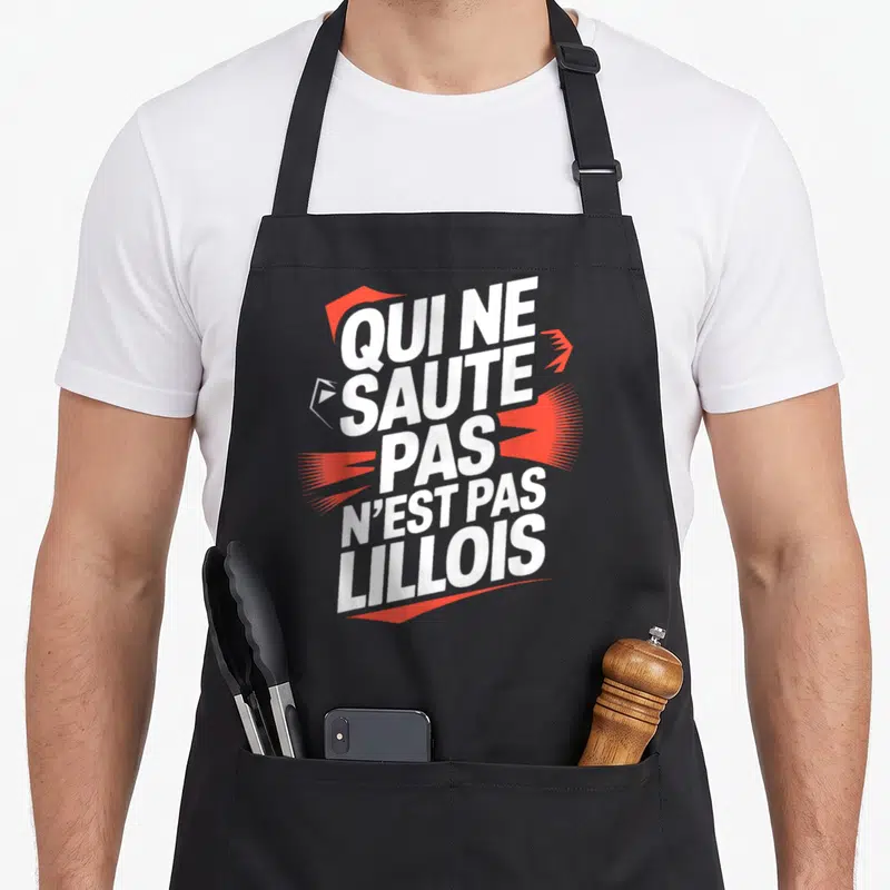 Tablier de cuisine noir avec inscription blanche et éléments graphiques rouges évoquant le sport.