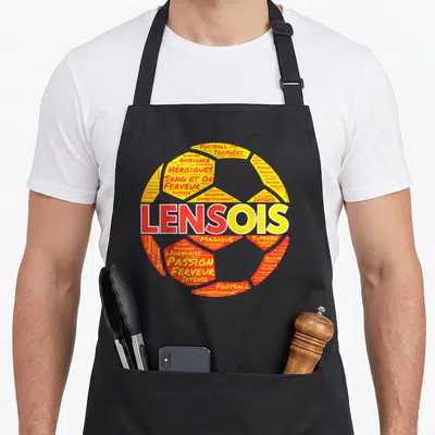 Tablier de cuisine noir avec un ballon de football stylisé aux couleurs orange et rouge contenant des mots comme Lensois et Passion.