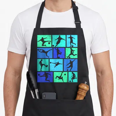 Tablier de cuisine noir avec douze cases colorées montrant des silhouettes de footballeurs en mouvement.
