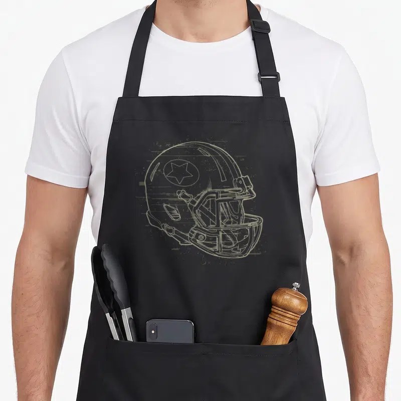 Tablier de cuisine noir avec illustration casque de football américain en lignes fines et effet glitch pixelisé beige clair.