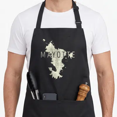 Tablier de cuisine noir avec une carte de Mayotte et le texte MAYOTTE en lettres capitales texturées.
