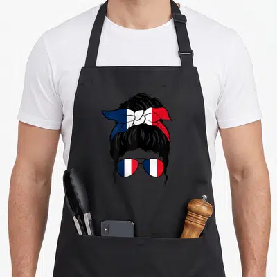 Tablier de cuisine noir avec illustration femme au chignon bandana et lunettes tricolores français