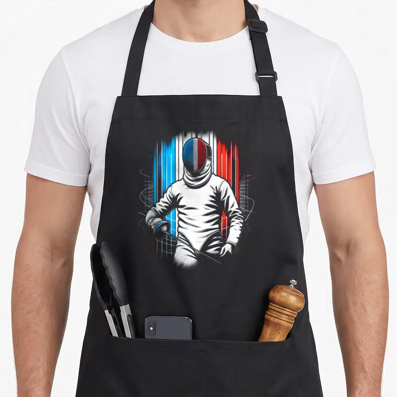 Tablier de cuisine noir avec illustration d'un escrimeur au masque tricolore français sur fond de strokes bleus blancs rouges