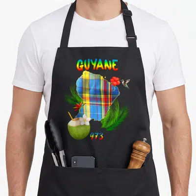 Tablier de cuisine noir avec carte Guyane madras, hibiscus, colibri et coco