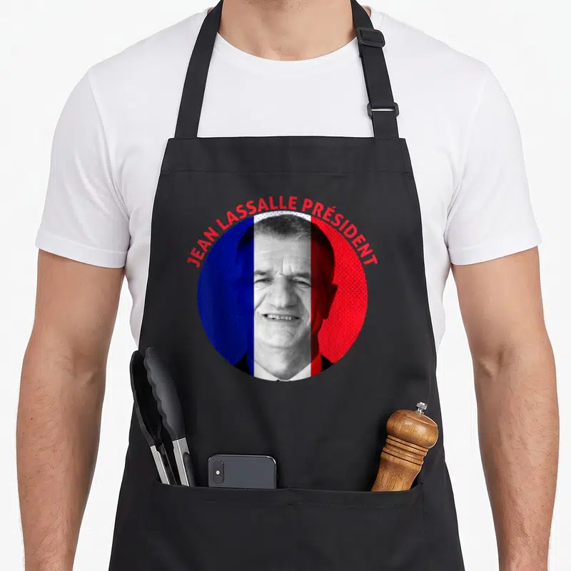 Tablier de cuisine noir avec portrait circulaire Jean Lassale et texte président 2022 sur fond tricolore français.