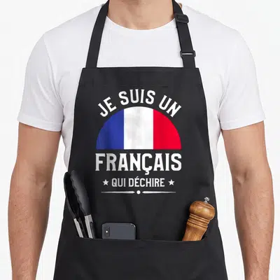 Tablier de cuisine noir avec drapeau français semi-circulaire et texte blanc Je Suis Un Français Qui Déchire.