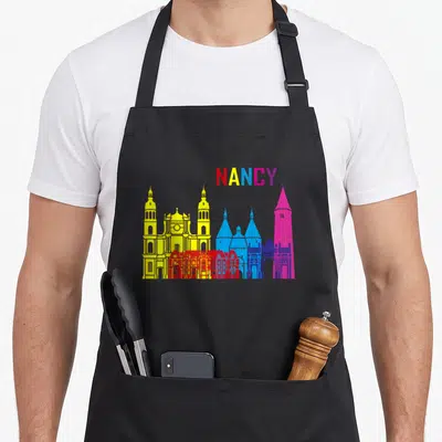 Tablier de cuisine noir avec skyline de Nancy aux couleurs vives et nom stylisé