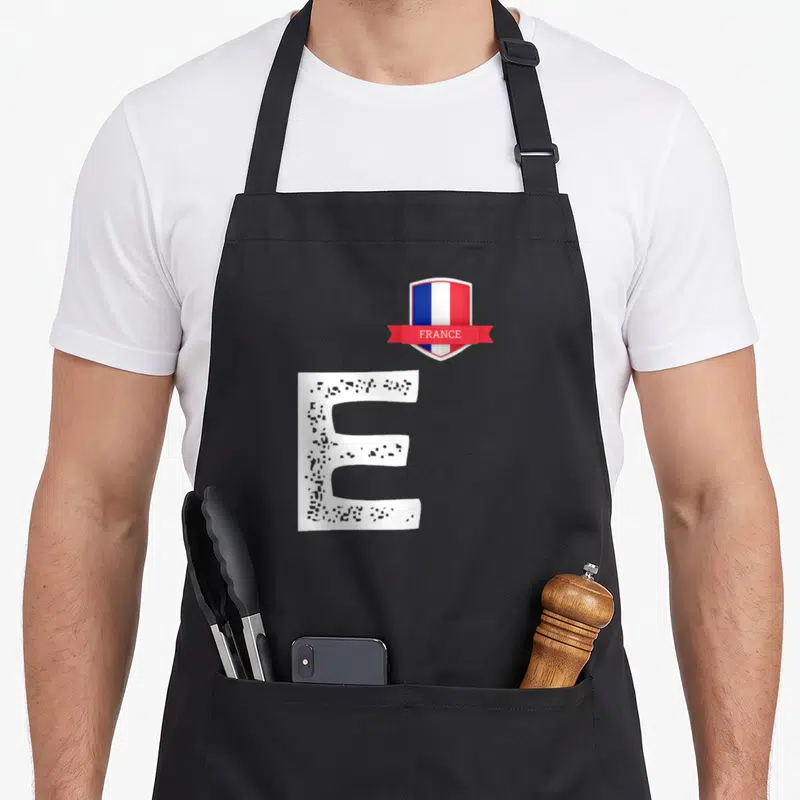 Tablier de cuisine noir avec grande lettre E blanche et écusson drapeau France FRANCE