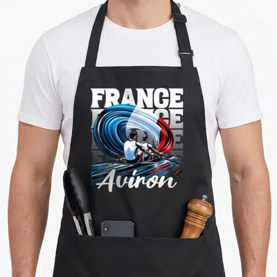 Tablier de cuisine noir avec illustration de rameurs et d'une vague aux couleurs du drapeau français.