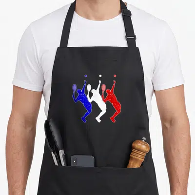 Tablier de cuisine noir avec trois silhouettes de joueurs de tennis bleue blanche et rouge.