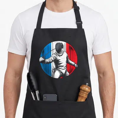 Tablier de cuisine noir avec escrimeur maské brandissant une lame sur fond de drapeau français circulaire.