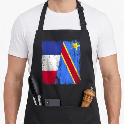 Tablier de cuisine noir avec motif demi drapeau France Congo style grunge et étoile jaune.