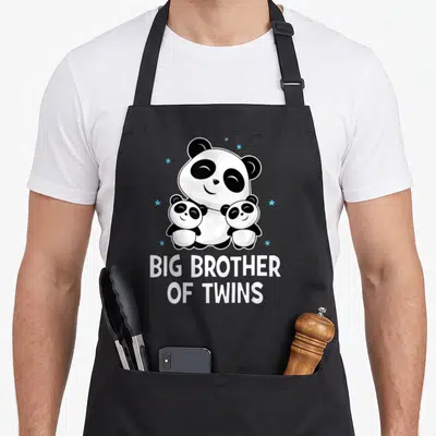 Tablier de cuisine noir avec trois pandas souriants et l'inscription Big Brother of Twins en blanc.