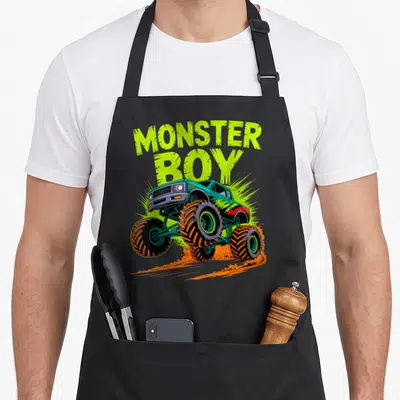 Tablier de cuisine noir avec illustration de monster truck turquoise et texte Monster Boy en vert fluo