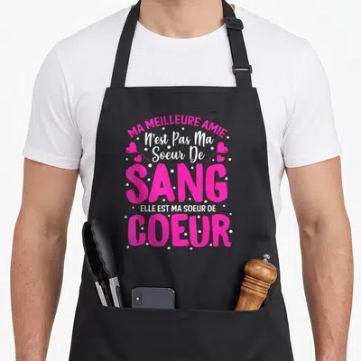 Tablier de cuisine noir avec texte rose Ma meilleure amie Soeur de Coeur et petits coeurs blancs.