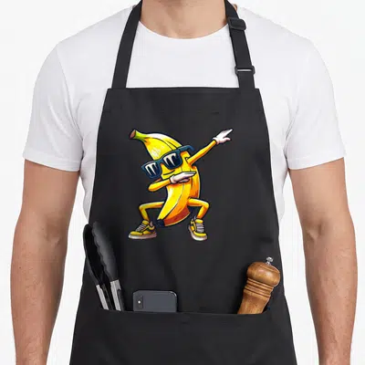 Tablier de cuisine noir avec une banane jaune aux lunettes de soleil effectuant une pose dab stylisée.