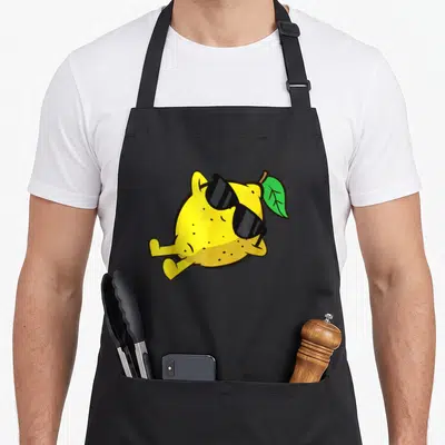 Tablier de cuisine noir avec un citron jaune relaxant portant des lunettes noires et une feuille verte.