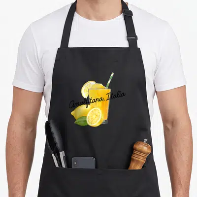 Tablier de cuisine noir avec illustration d'un granita au citron et de fruits frais.