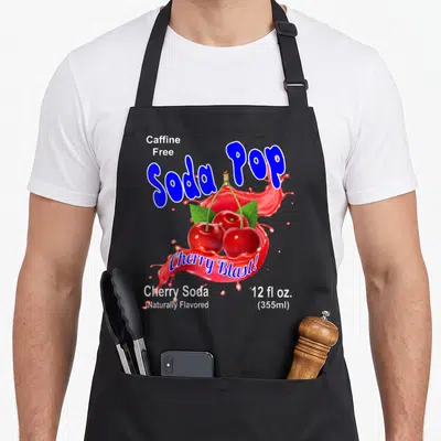 Tablier de cuisine noir avec illustration de Soda Pop Cherry Blast et deux cerises rouges.