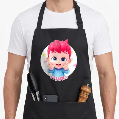 Tablier de cuisine noir avec illustration colorée de Finn Smile aux cheveux roses et nom en bas.
