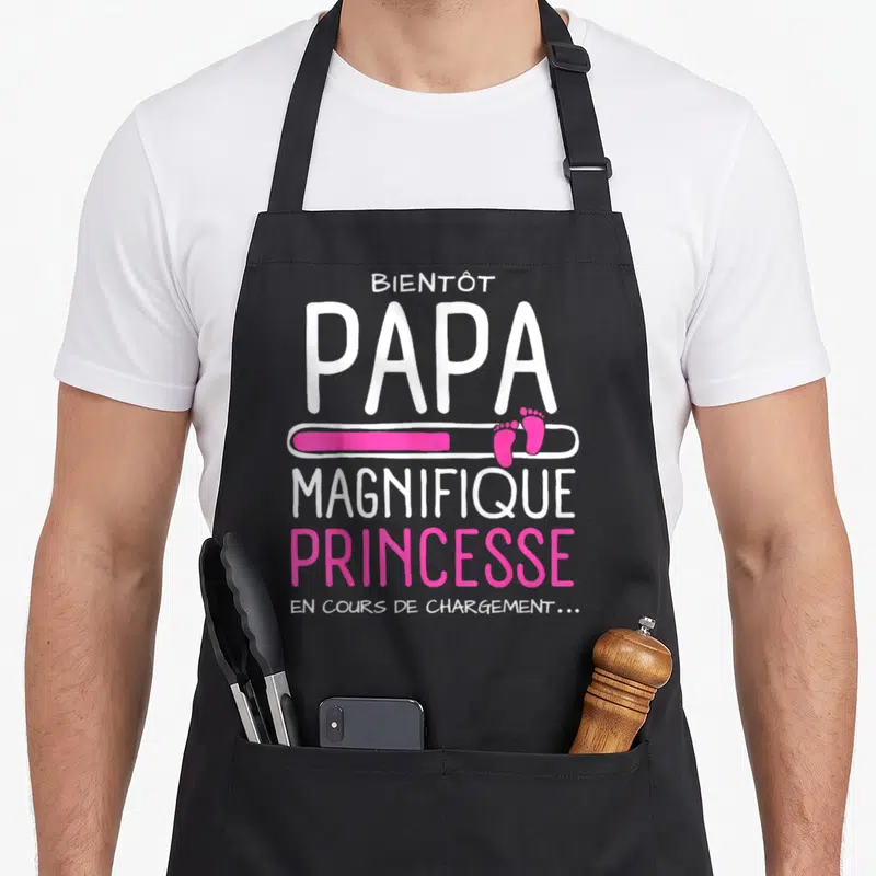 Tablier de cuisine noir avec message Bientôt Papa Magnifique Princesse et illustration de test de grossesse rose