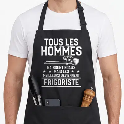 Tablier de cuisine noir avec inscription blanche Tous les hommes naissent égaux mais les meilleurs deviennent frigoriste et une clé à molette.
