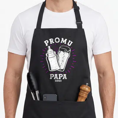 Tablier de cuisine noir avec illustration biberon et verre de bière Promu Papa 2023 en blanc et rose.