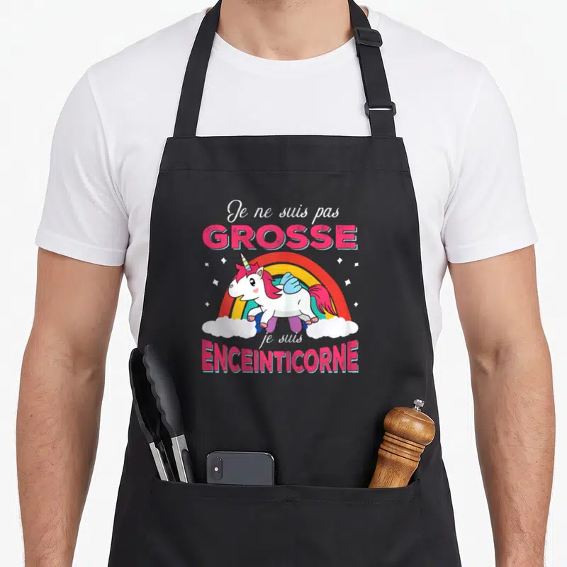 Tablier de cuisine noir avec une licorne arc-en-ciel et le texte Je ne suis pas Grosse je suis Enceinticorne