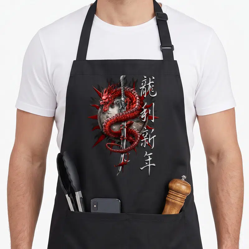 Tablier de cuisine noir avec dragon rouge, katana et caractères asiatiques imprimés au centre.