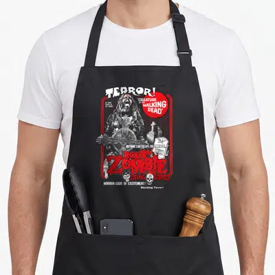 Tablier de cuisine noir avec illustration Rob Zombie et texte TERROR en rouge et blanc style vintage horreur