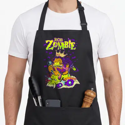 Tablier de cuisine noir avec illustration colorée d'un monstre chanteur couronné Rob Zombie