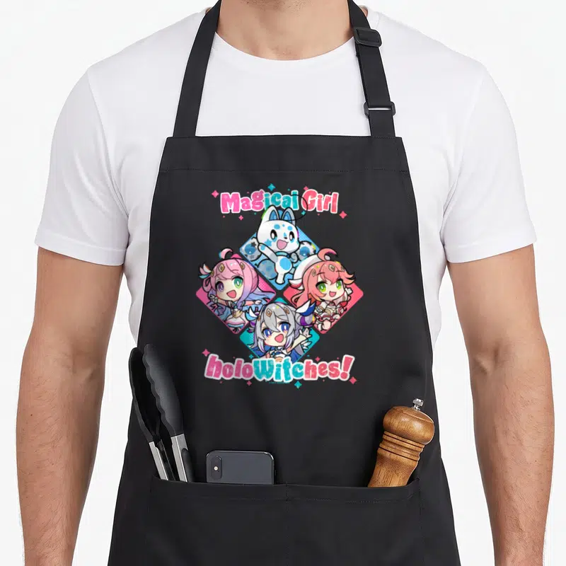 Tablier de cuisine noir avec l'illustration des personnages Magical Girl holoWitches en style chibi.